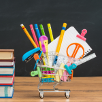  school supplies in a shopping cart.